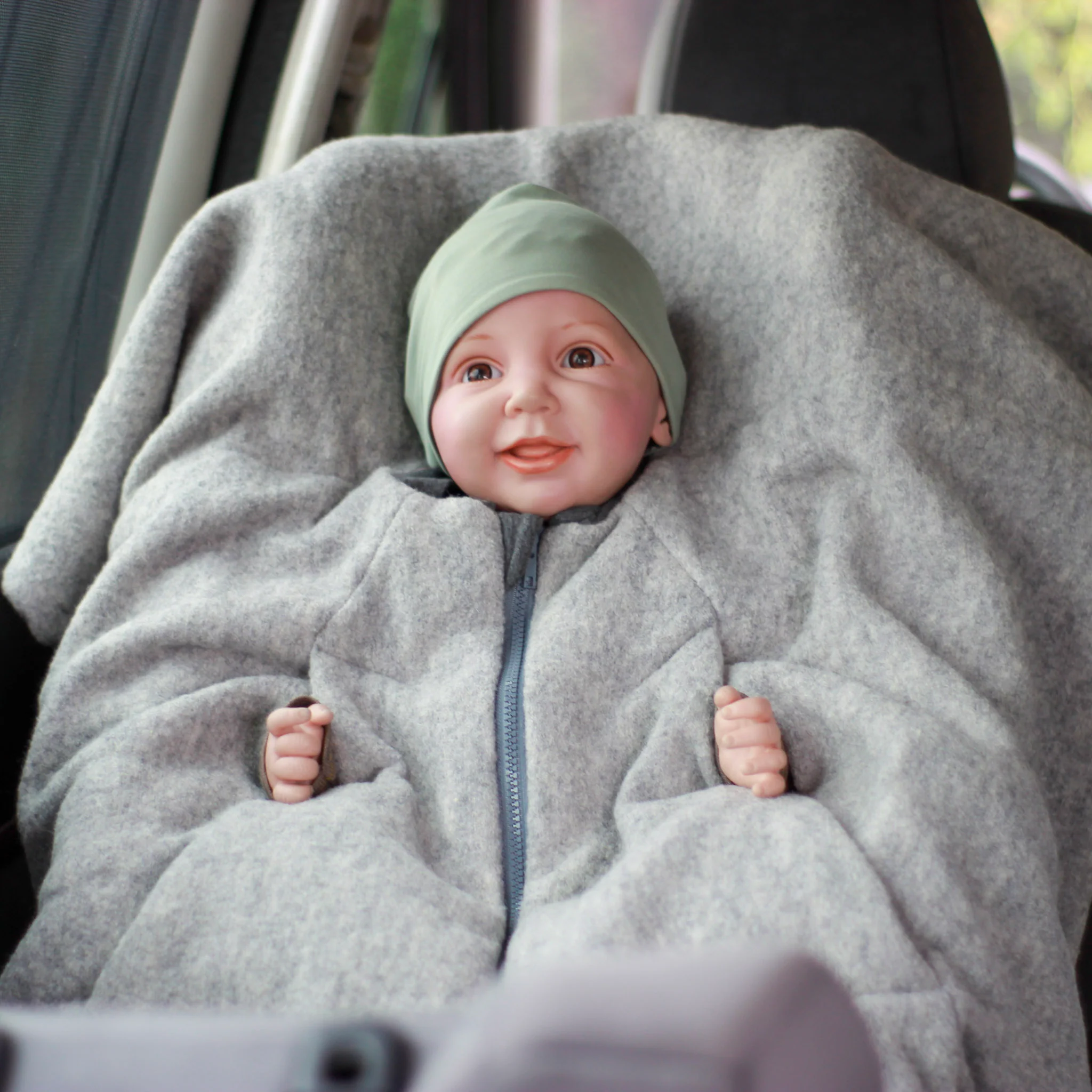 [504012-01] Kikkifax Kindersitzponcho aus Wollwalk (Pure Grey)